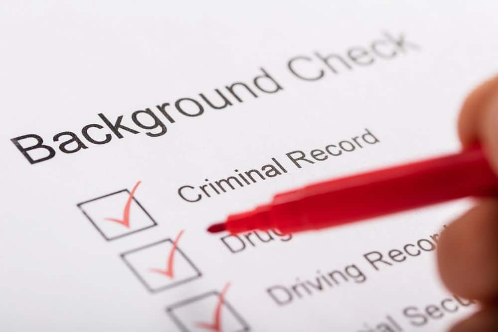Closeup of checklist showing criminal record section during washington background checks